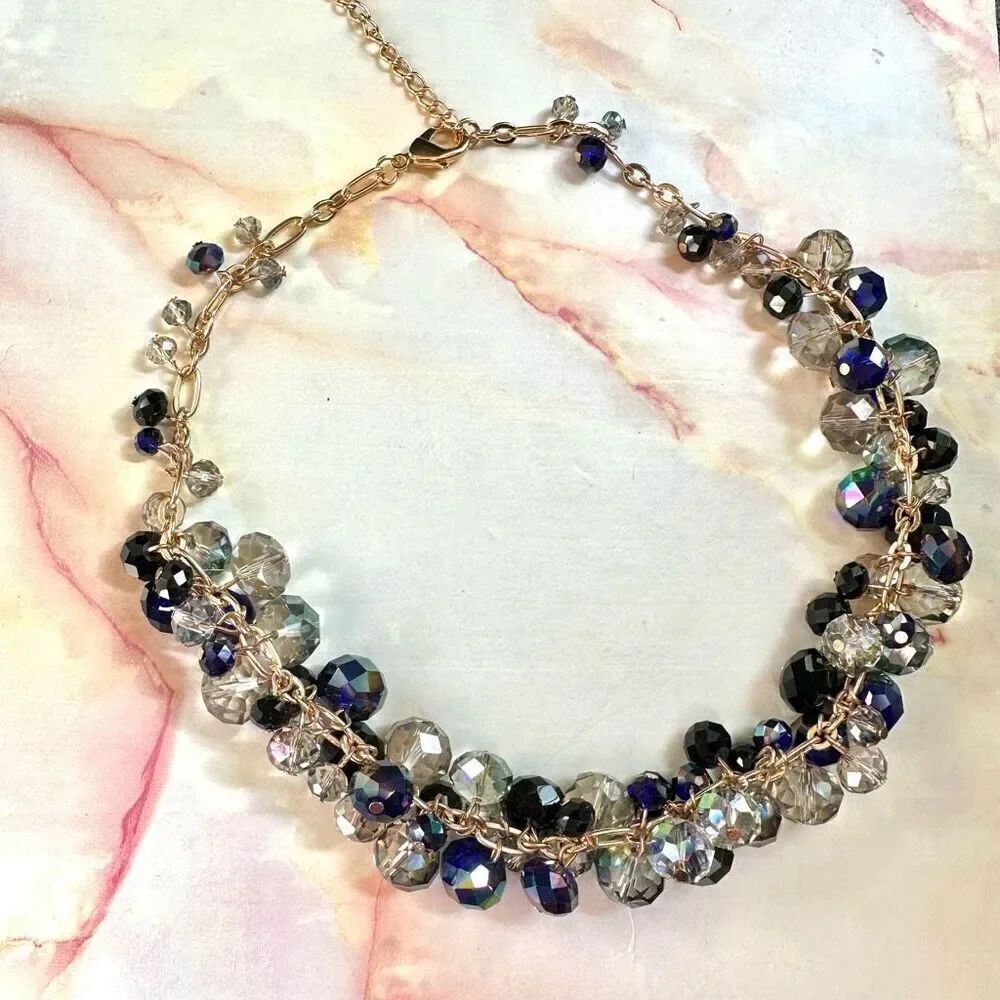 Multi bead gold tone necklace